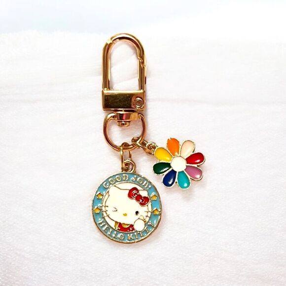 Blue Rainbow Flower Hello Kitty Bag Charm Zipper Pull - Picture 1 of 2
